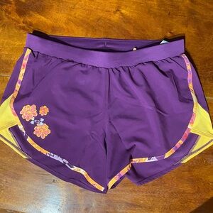 Purple and yellow under armour shorts size medium brand new